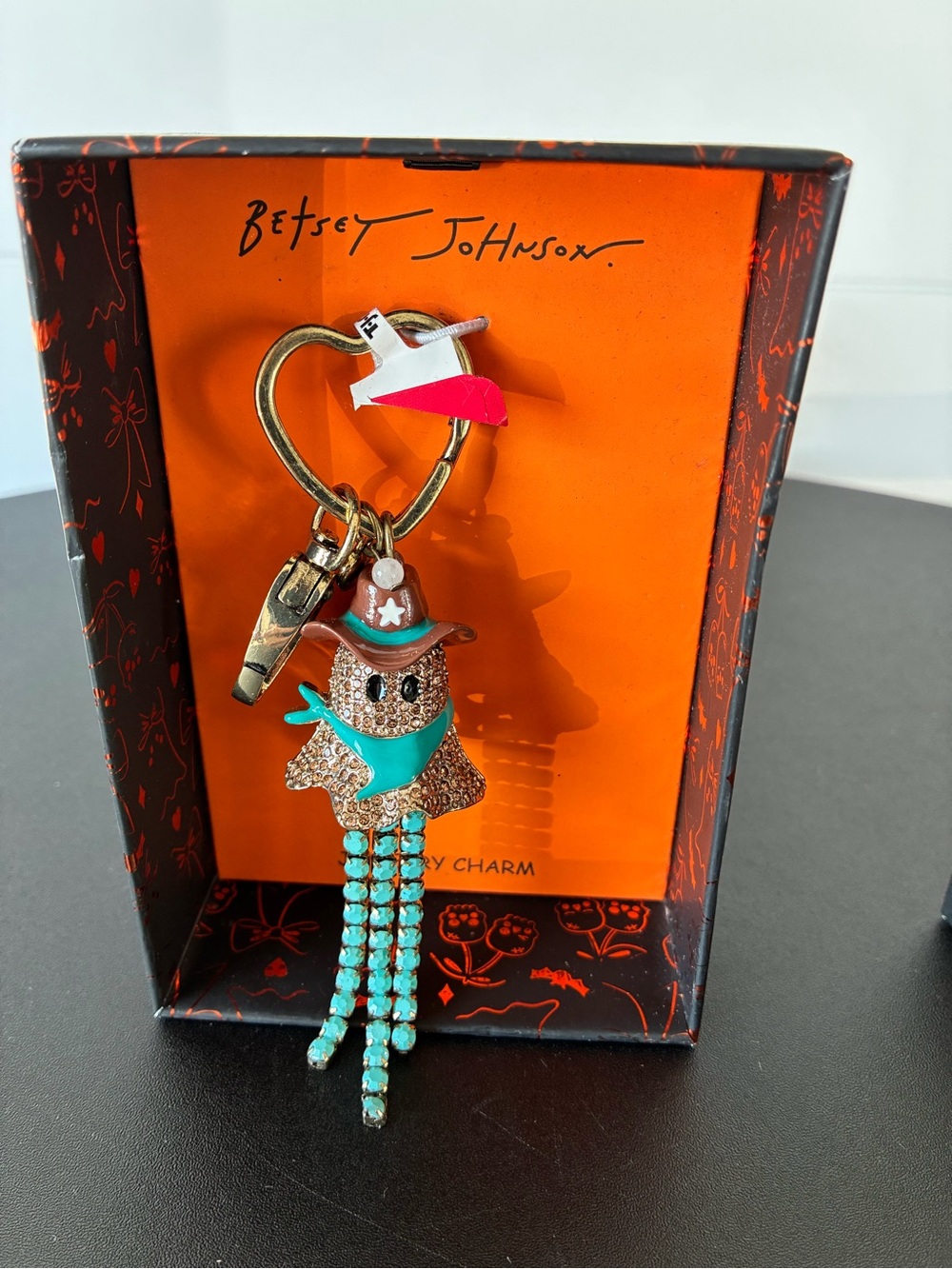 NWT and box Betsey Johnson spooky sheriff cowboy ghost bag charm and keychain.